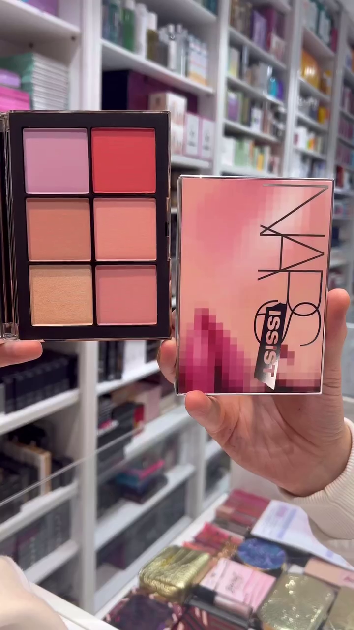 A beautiful blush and highlighter palette featuring a range of soft pink and coral tones, perfect for adding a radiant flush to the cheeks.