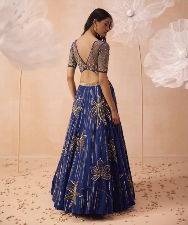 royal blue designer embroidered lehenga choli with net dupatta featuring golden zari, sequins, and bead work for wedding, reception, cocktail party, and festive celebrations